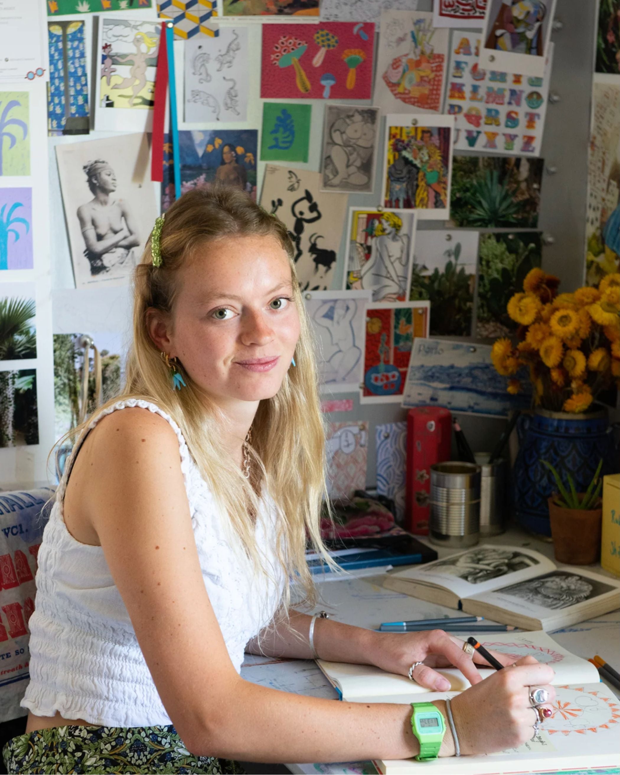 Portrait of artist Hannah Watts in her studio
